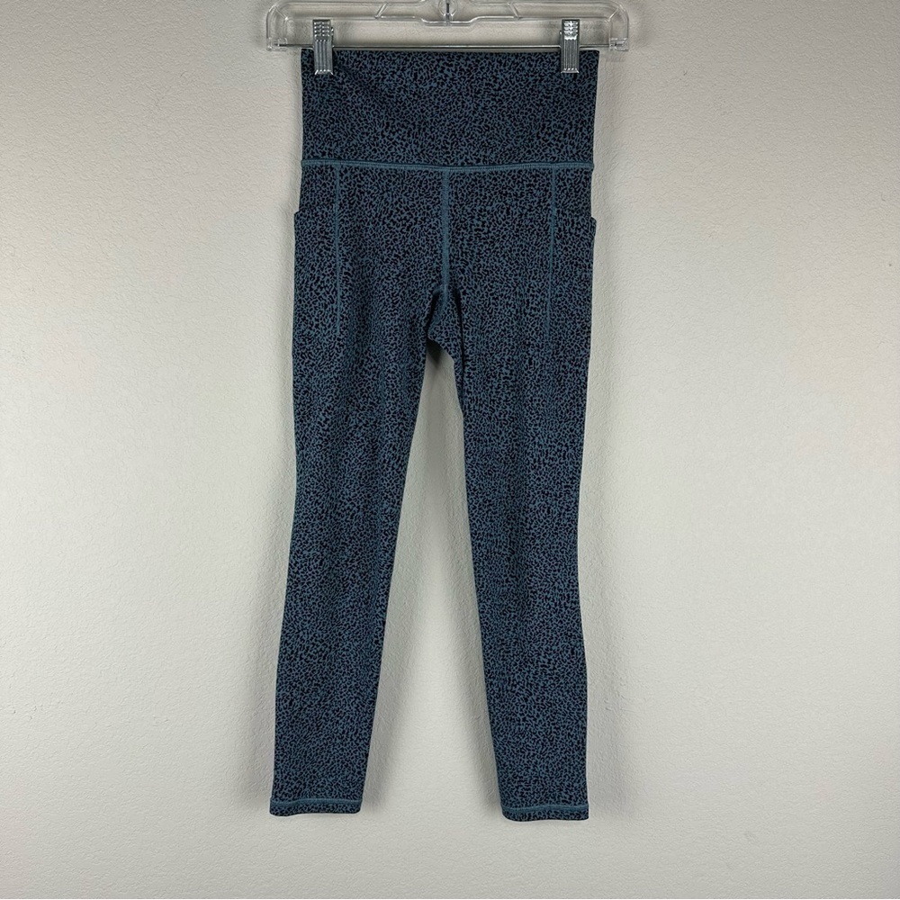 Athleta Blue Black Cheetah Salutation Stash Pocket II Textured Tights Size XXS